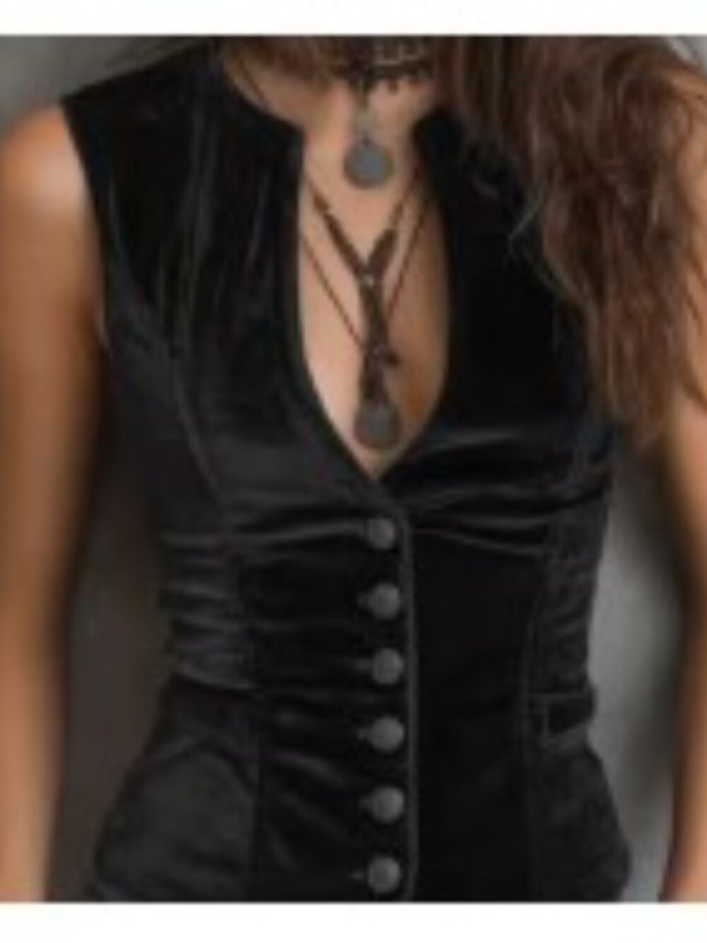 Black velvet vest with front buttons New without tags.